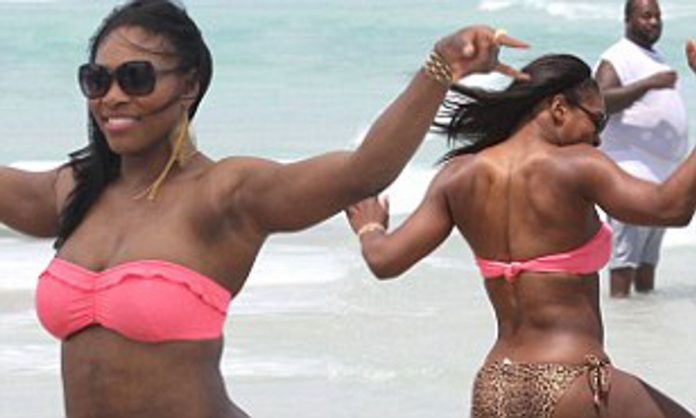 Serena Williams gets her beach wiggle on